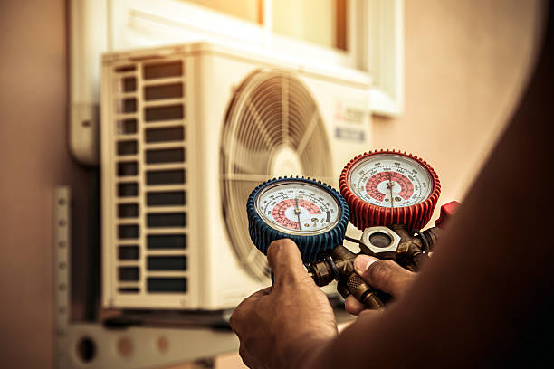 Professional Air Conditioning Service technician working in East Olympia, WA
